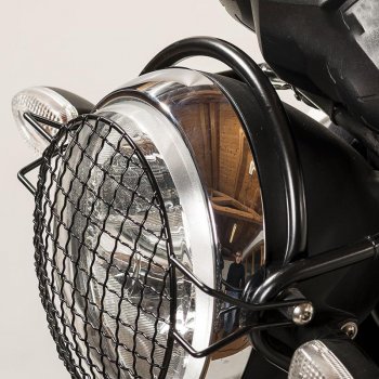 Tubo de protección delantero del faro