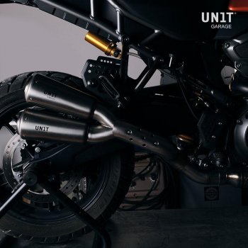 Doble silenciador bajo de titanio con soldadura visible